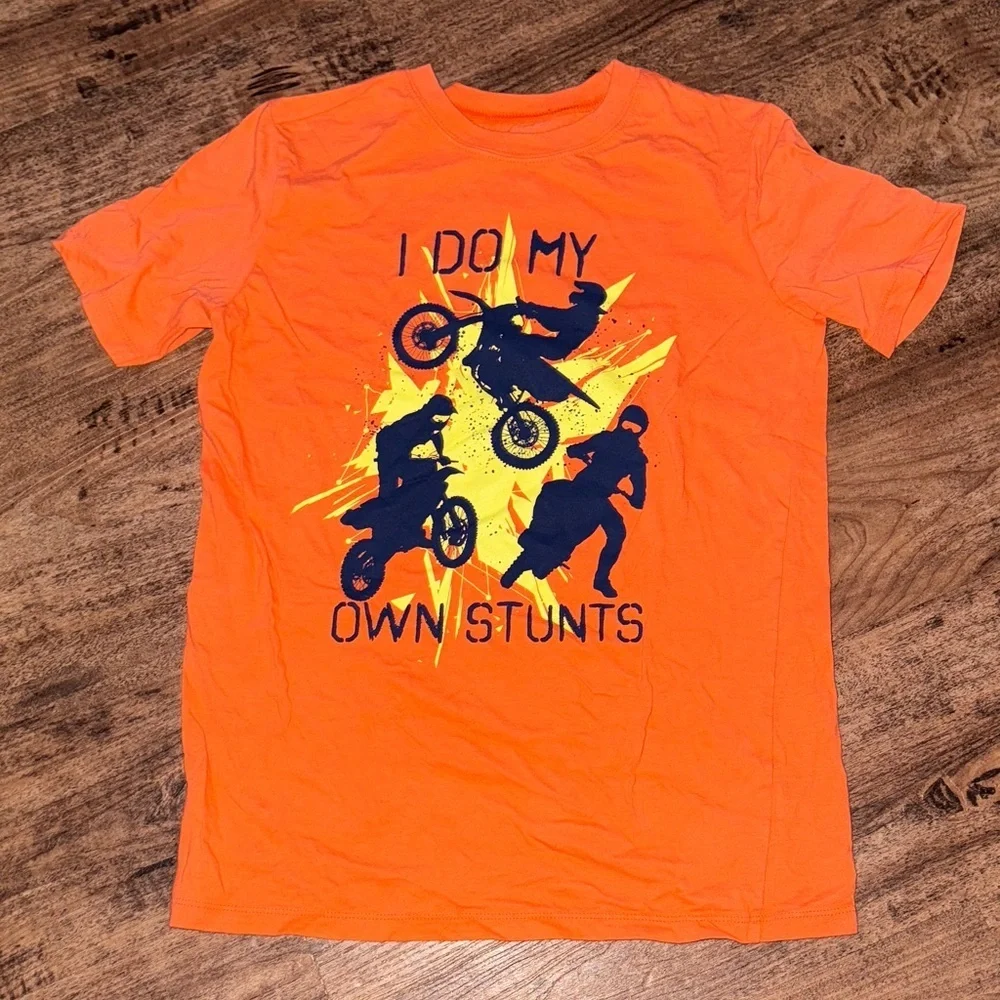 Orange Graphic T-Shirt with Stunt Design size 14